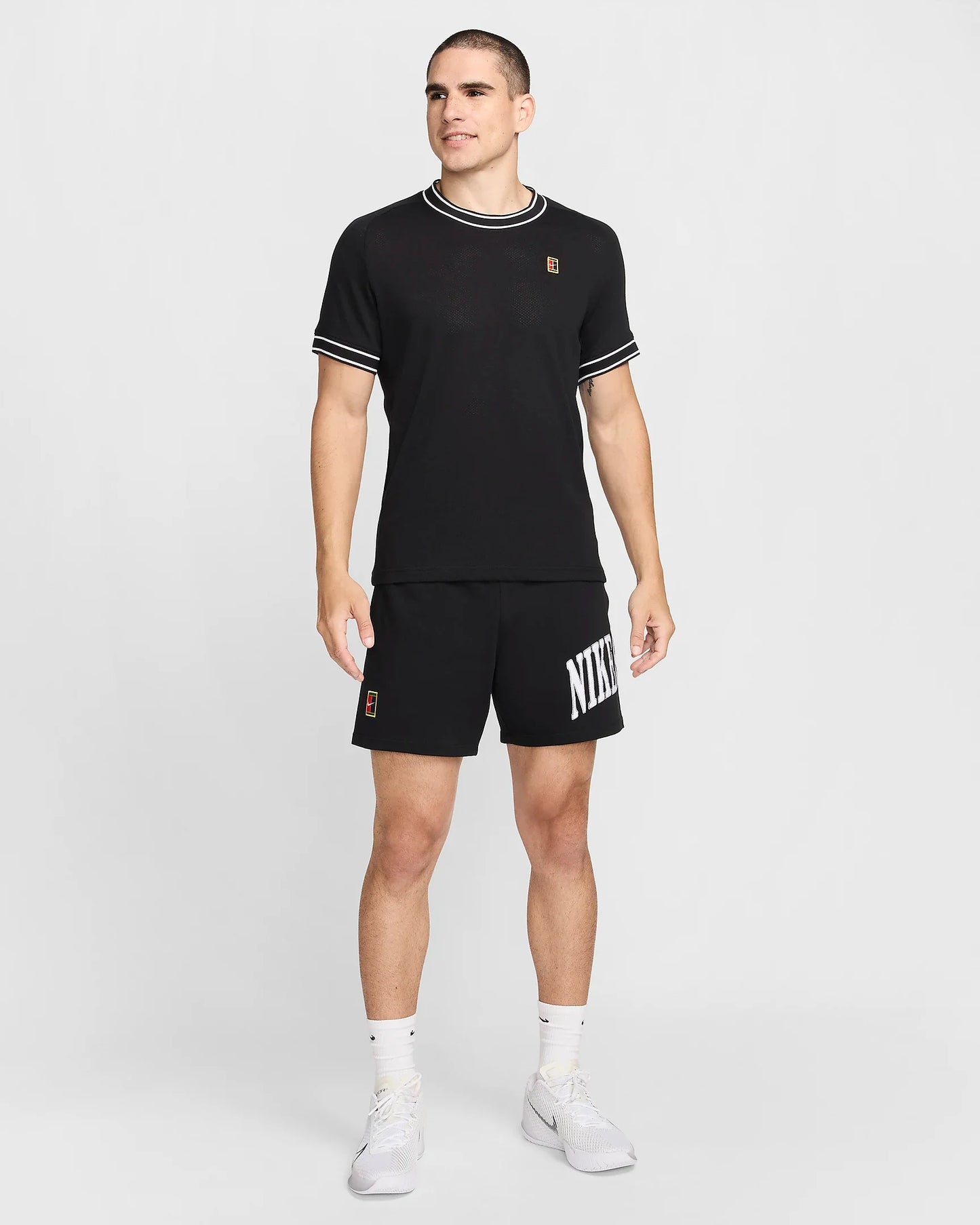 NikeCourt Heritage Men's Short-Sleeve Tennis Top - Black - FN0318-010